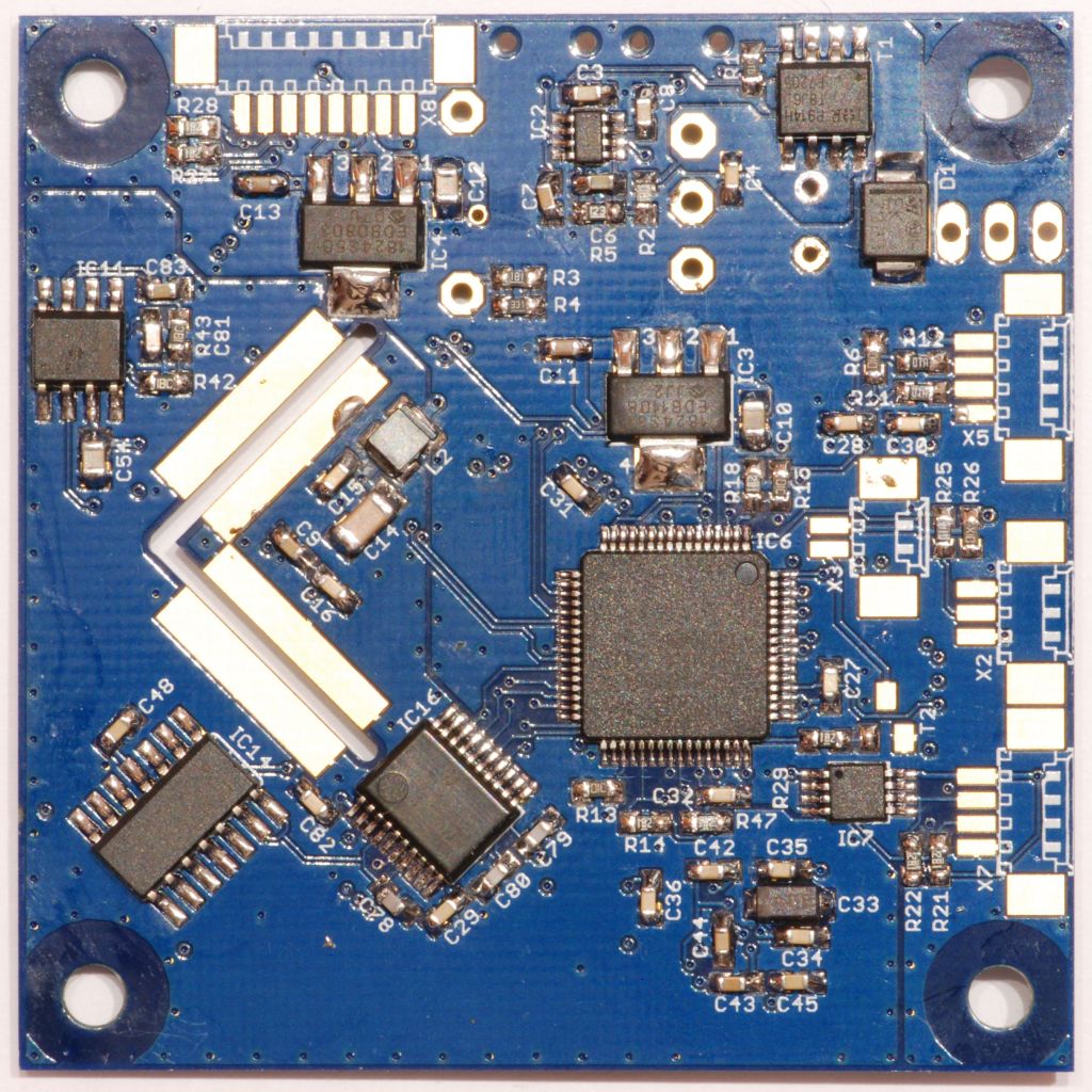 fc-board bottomside with multipin-ICs and small stuff soldered